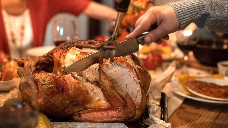 FILE - Your Thanksgiving meal will cost less this year, experts say.