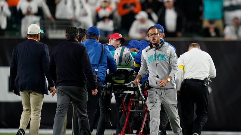 Miami Dolphins quarterback Tua Tagovailoa is taken off the field on a stretcher during the...