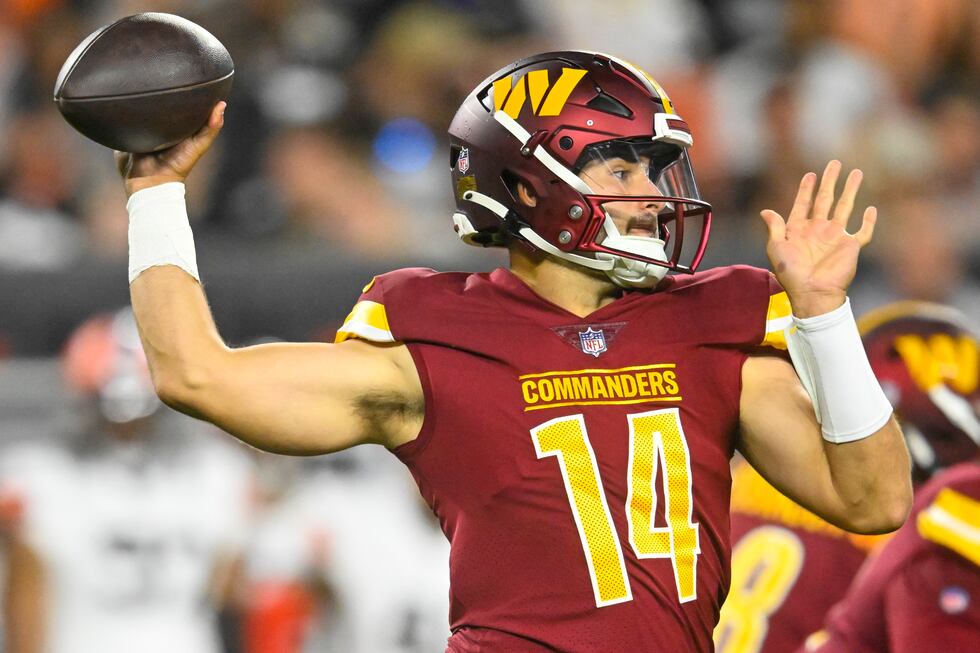 Washington Commanders quarterback Sam Howell passes against the Cleveland Browns during the...