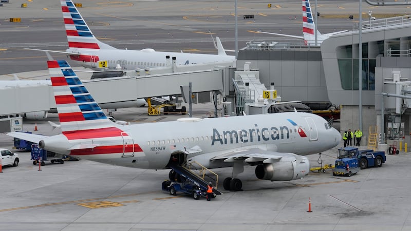 FILE - American Airlines planes sit on the tarmac at Terminal B at LaGuardia Airport, Jan. 11,...